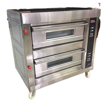 Round Coconut Bread Baking Made Easy with Large Deck Oven Machine at Pie Long Loaf Bakery
